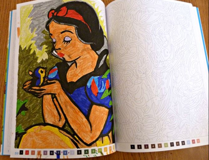 Discover the Magic of Christmas with a Disney Mystery Coloring Book